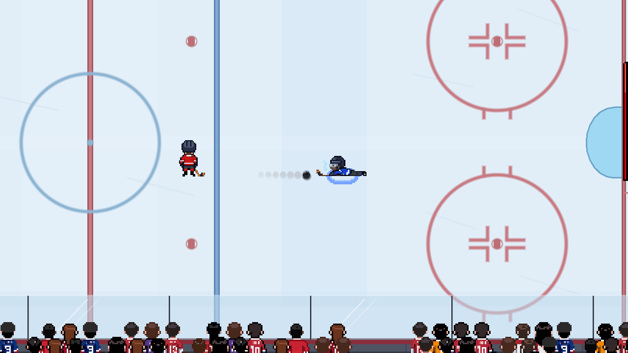 The blue defender slides left on the ice as a shot approaches from the red skater.
