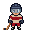 Skater in a tan jersey with a crimson chest band and pants, tan socks, a charcoal helmet, and a wooden stick
